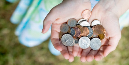 m12240097 giving hands with change 514x260